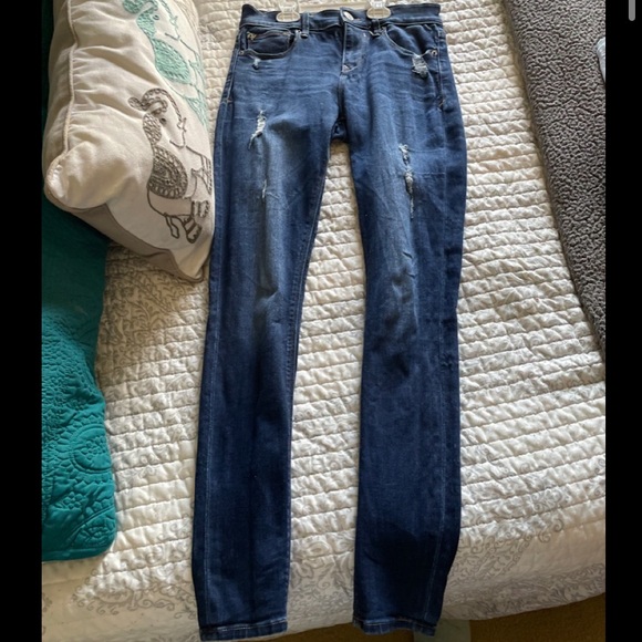 Express distressed skinny jeans